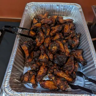 a tray of chicken wings