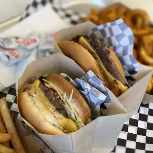 Cheeseburgers. Fries. Curly fries.