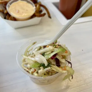 Side of coleslaw.