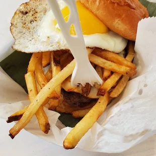Single Beef frita w/ sunny side up egg & muenster