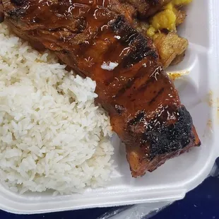 Bbq pork ribs with rice and plantains