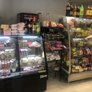 Market items like sweets and cheeses for sale