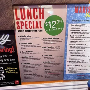 Sign hanging in lobby. Says was not their prices