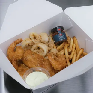 Ocean's Catch: fried shrimp, calamari and cod with 1 side and sauce