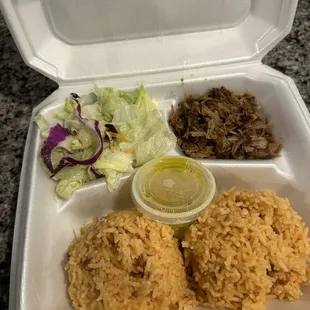 Lunch item ! Lechon with arroz and a salad, yum!