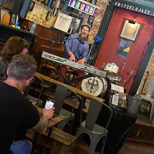 a man playing a guitar