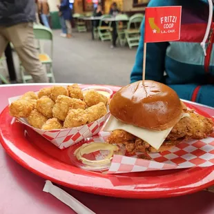a plate of fried chicken and a sandwich