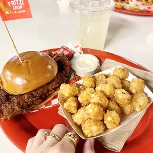 a plate of fried chicken and a burger