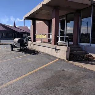 The smoker is full of sausages and smells great