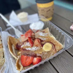 Strawberries &amp; Banana Crepe with a small hot chocolate