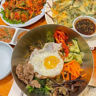 Bibimbap
 (Top left) Beef Chitterlings
 (Top right) Seafood Pancake