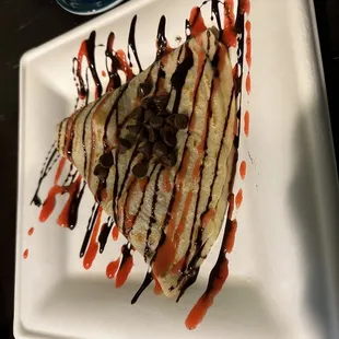 a chocolate drizzle on a banana