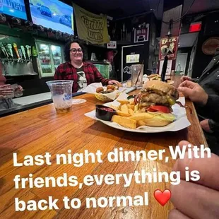 a man eating a burger