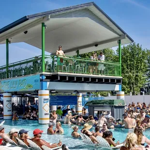 a crowd of people in a swimming pool