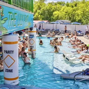 a crowd of people in a pool