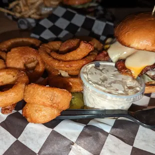 a burger and onion rings