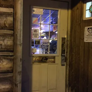 a door to a restaurant