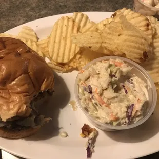 Burgers come with coleslaw or pasta salad and chips