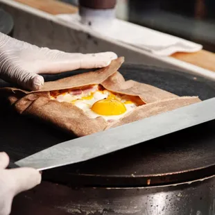 Breakfast of Champions, hence called Champion Crepe: Ham, eggs, cheese.