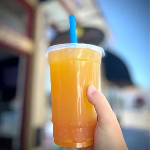 Mango green tea with mango boba