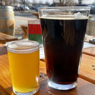 a pint and a glass of beer