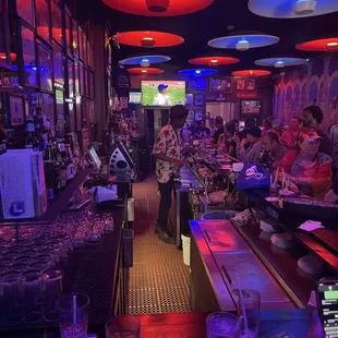 people sitting at the bar