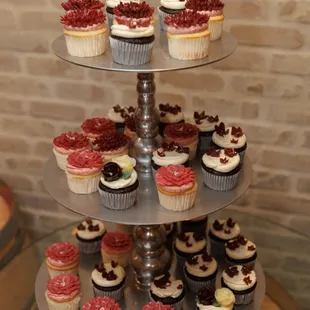 Assorted buttercream flower cupcakes.