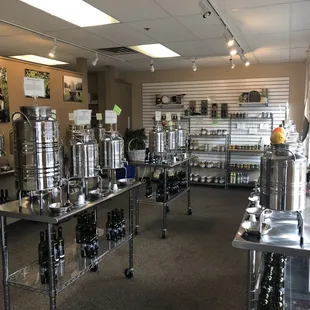 a room full of stainless steel tanks