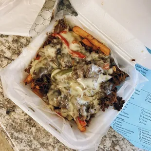 Philly cheesesteak fries / $14.99, w/ double meat / $2.50 (delivery pricing)