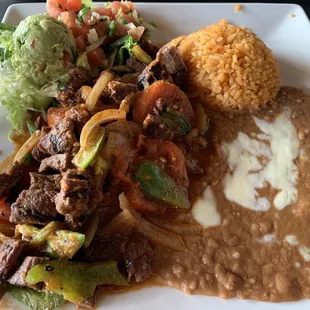 I ordered Carne guisada and got Bistec Ranchero. I guess they call it guisada de rez.