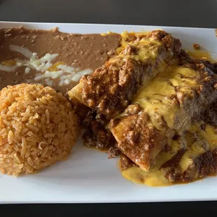 Beef enchiladas with can chili over it. Suppose to be beef Enchiladas with Chili con carne sauce.