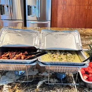 Shrimp &amp; grits, bacon and fresh fruit.