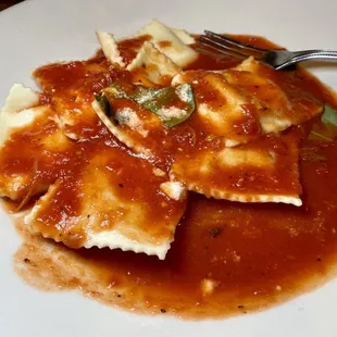 Cheese ravioli with marinara sauce.