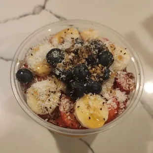 a bowl of fruit and yogurt