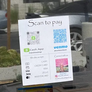 a sign in front of a window