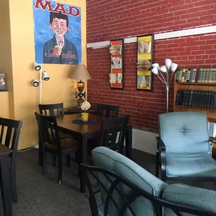 a brick wall with a portrait of a man