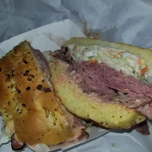 The News...Corn Beef and Pastrami w/ coleslaw swiss cheese, Russian dressing on onion roll..!!!