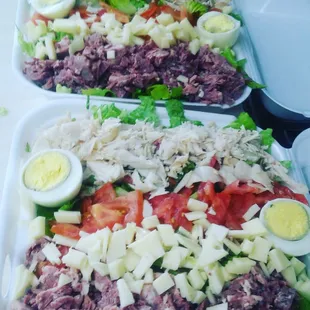 two trays of food