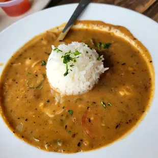 a bowl of gummy soup with rice