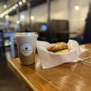 Iced latte and breakfast sandwich
