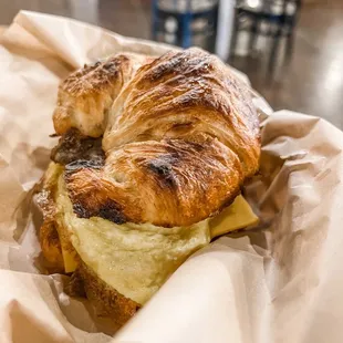 Croissant breakfast sandwich.