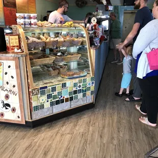customers waiting in line at the counter