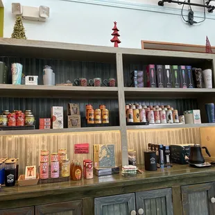 Goodies and merch for sale! Teas, honey, coffee mugs, coffee bean grinders, travel mugs.