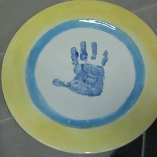 Memories child small hands forever in a usable plate