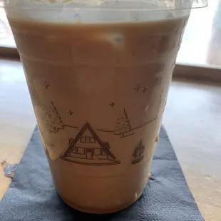 Iced oat milk 16 oz latte with vanilla and pistachio syrups