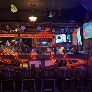 a bar with a large screen