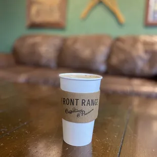 a coffee cup on a table