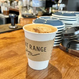 a cup of coffee on a table