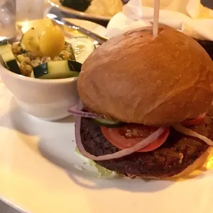 Veggie burger with quinoa salad