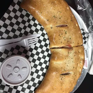 a piece of bread on a checkered plate